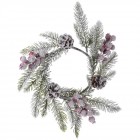 Елхови венец заснежен с шишарки и червени топчета